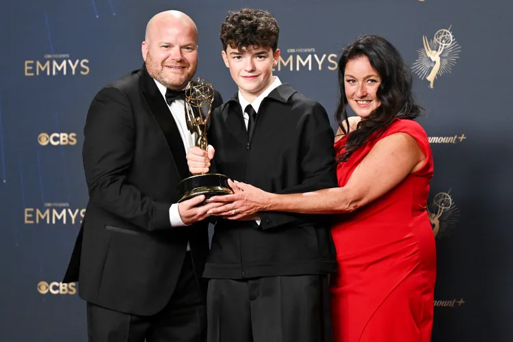Owen Cooper and his parents pose with his Outstanding Supporting Actor in a Limited or Anthology Series award for "Adolescence" at the 77th Primetime Emmy Awards held at the Peacock Theater on September 14, 2025 in Los Angeles.Credit : Gilbert Flores/Variety via Getty 