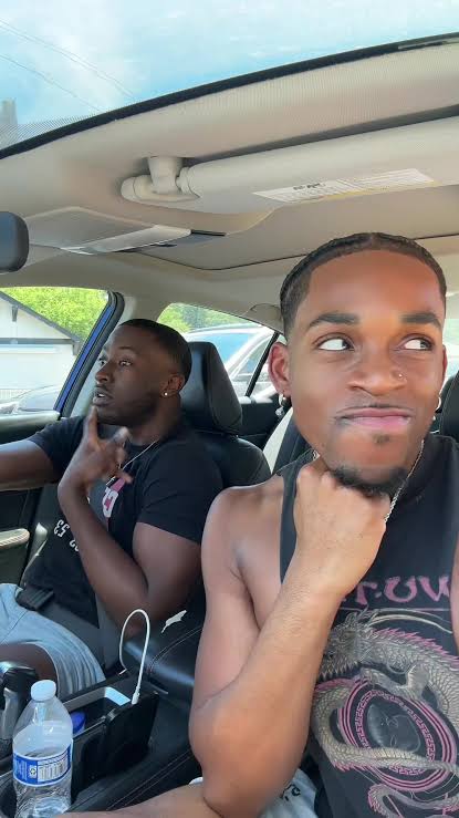 Image - Messiah Dixon, is pictured with his boyfriend, Isaiah Xavier, in one of their car drive thru, back in May 2024.